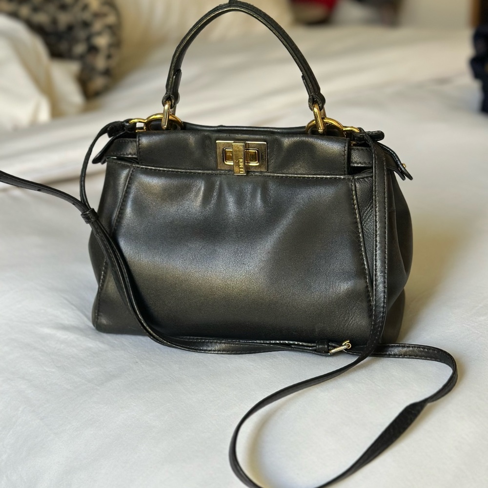 Fendi iconic small peekaboo in black nappa leather with gold hardware and strap